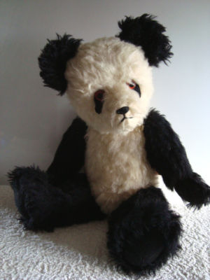 old panda teddy bear