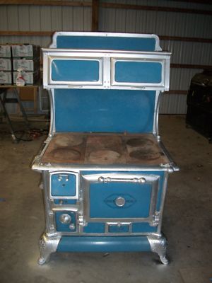 quick meal wood burning cook stove working good needs some work but not