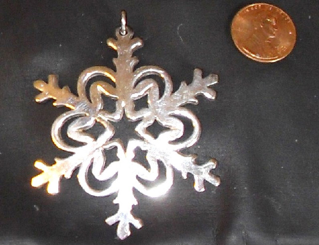 Reed & Barton silver snowflake pendant