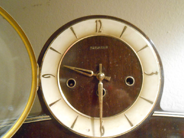 Walnut finish Tambour or 'Napoleon Hat', style clock.