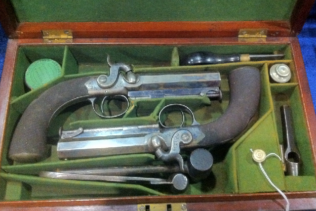 Cased Pair of English Percussion Pistols Cased Pair of English Percussion Pistols