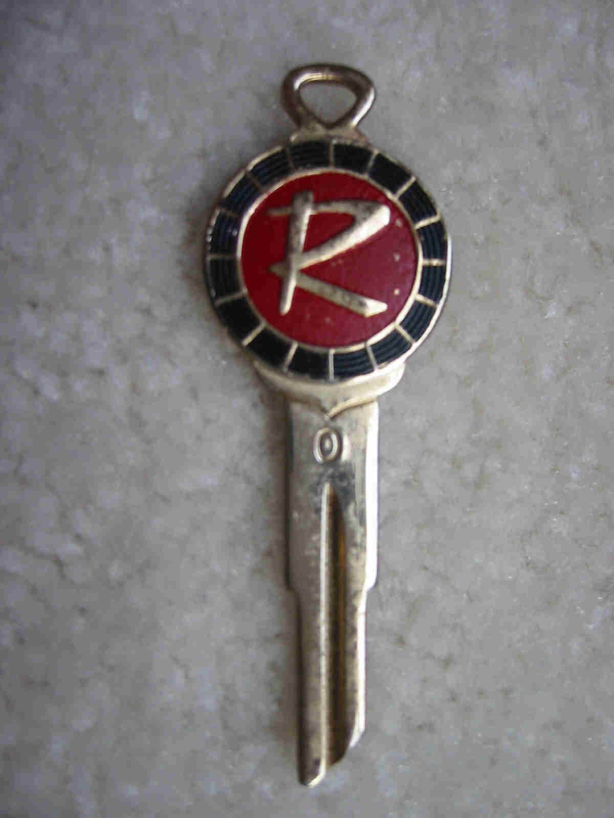 Rambler Crest Key Blank - Enameled