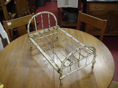 iron doll bed