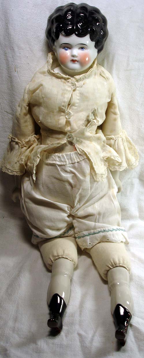 porcelain doll with cloth body
