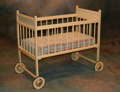 antique baby crib with wheels