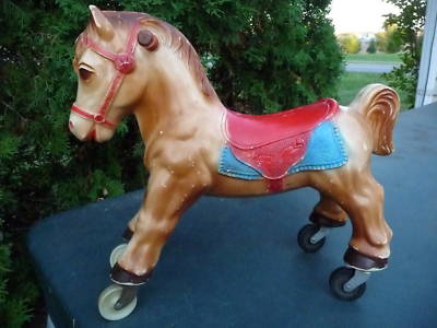 antique riding horse on wheels