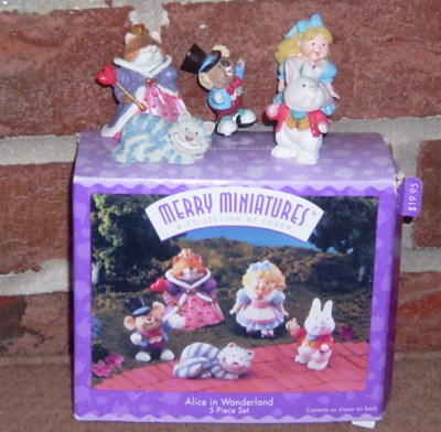 antique alice in wonderland figurines