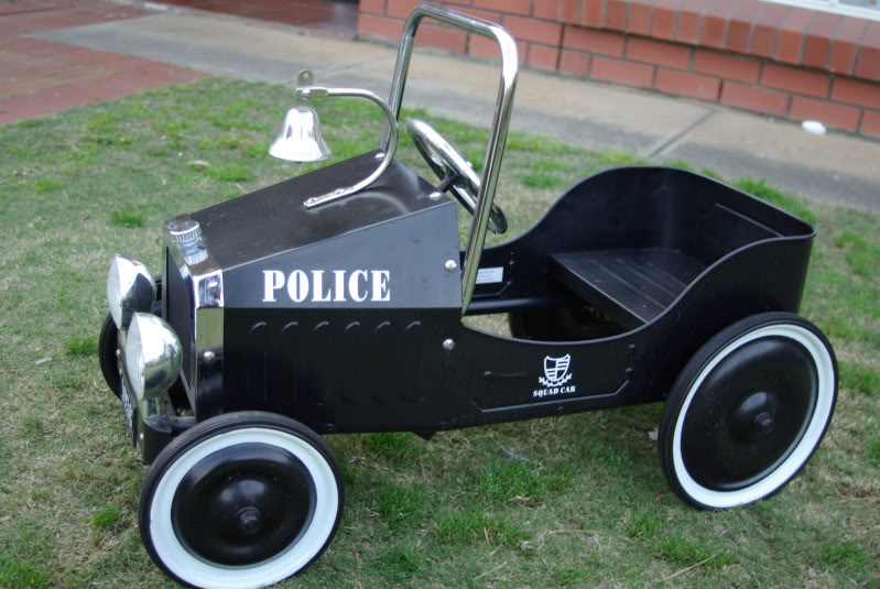 vintage police pedal car