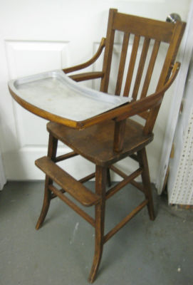 antique wooden high chair with metal tray