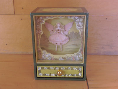 antique doll music box