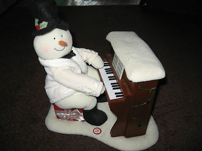 hallmark snowman playing the piano