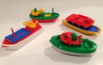 small plastic toy boats