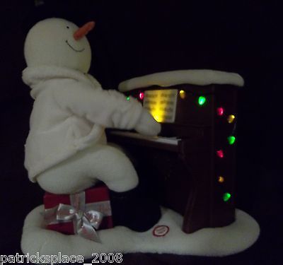 hallmark snowman playing the piano