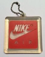 orange nike keychain