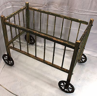 antique doll crib with wheels