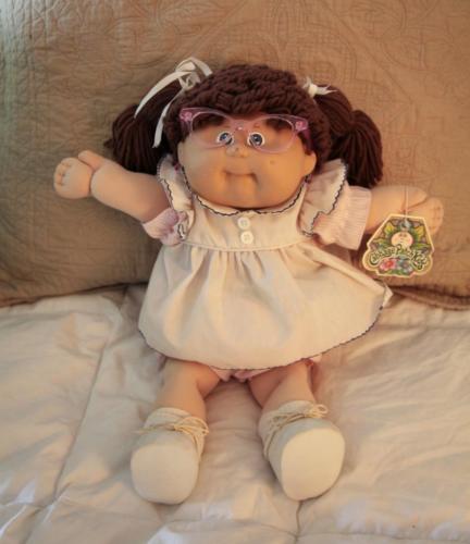 cabbage patch doll with glasses