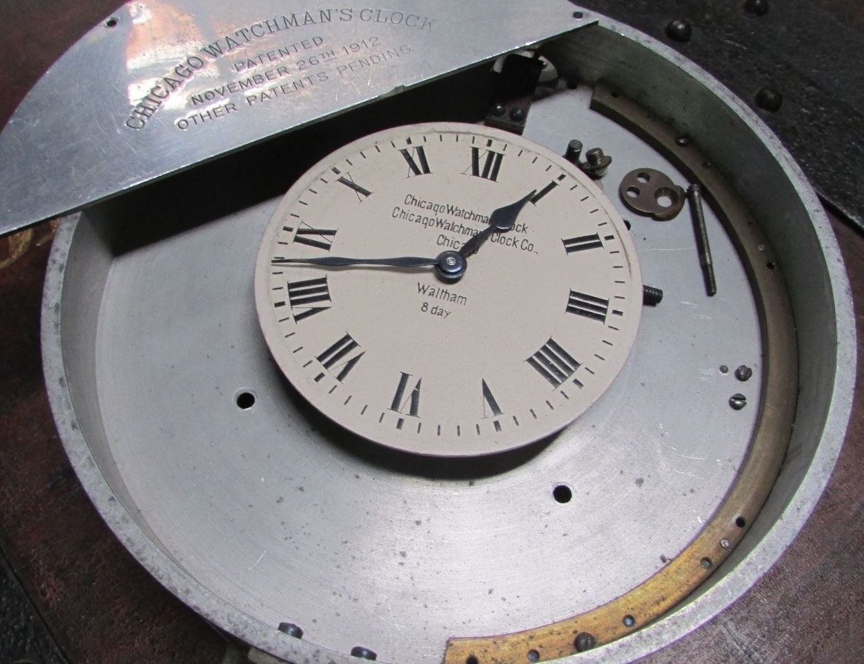 Antique clock movement Antique watchman's clock Waltham 8 day circa