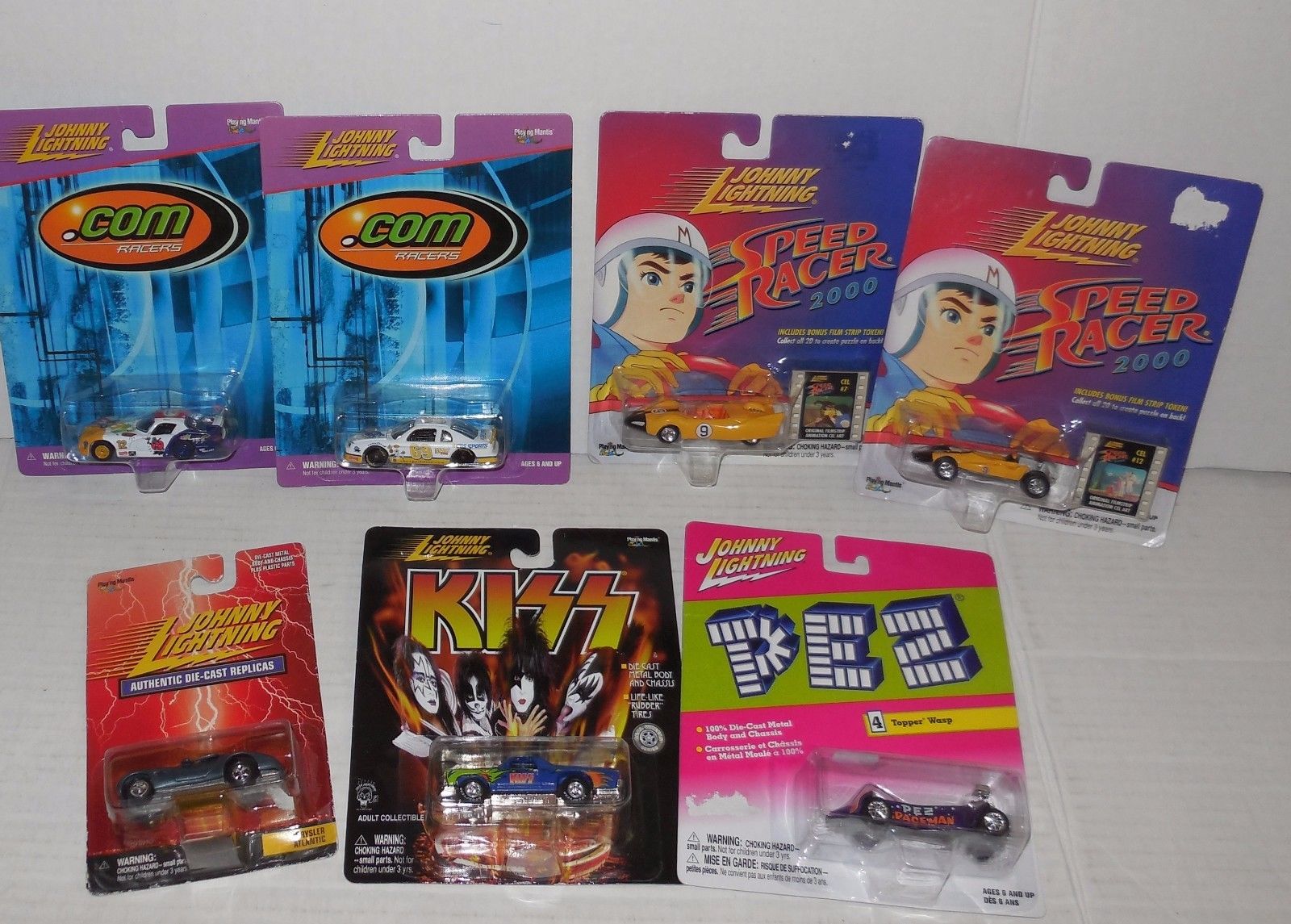 Lot of 7 Johnny Lightning Cars NEW MIP Kiss Pez Speed Racer – Antique