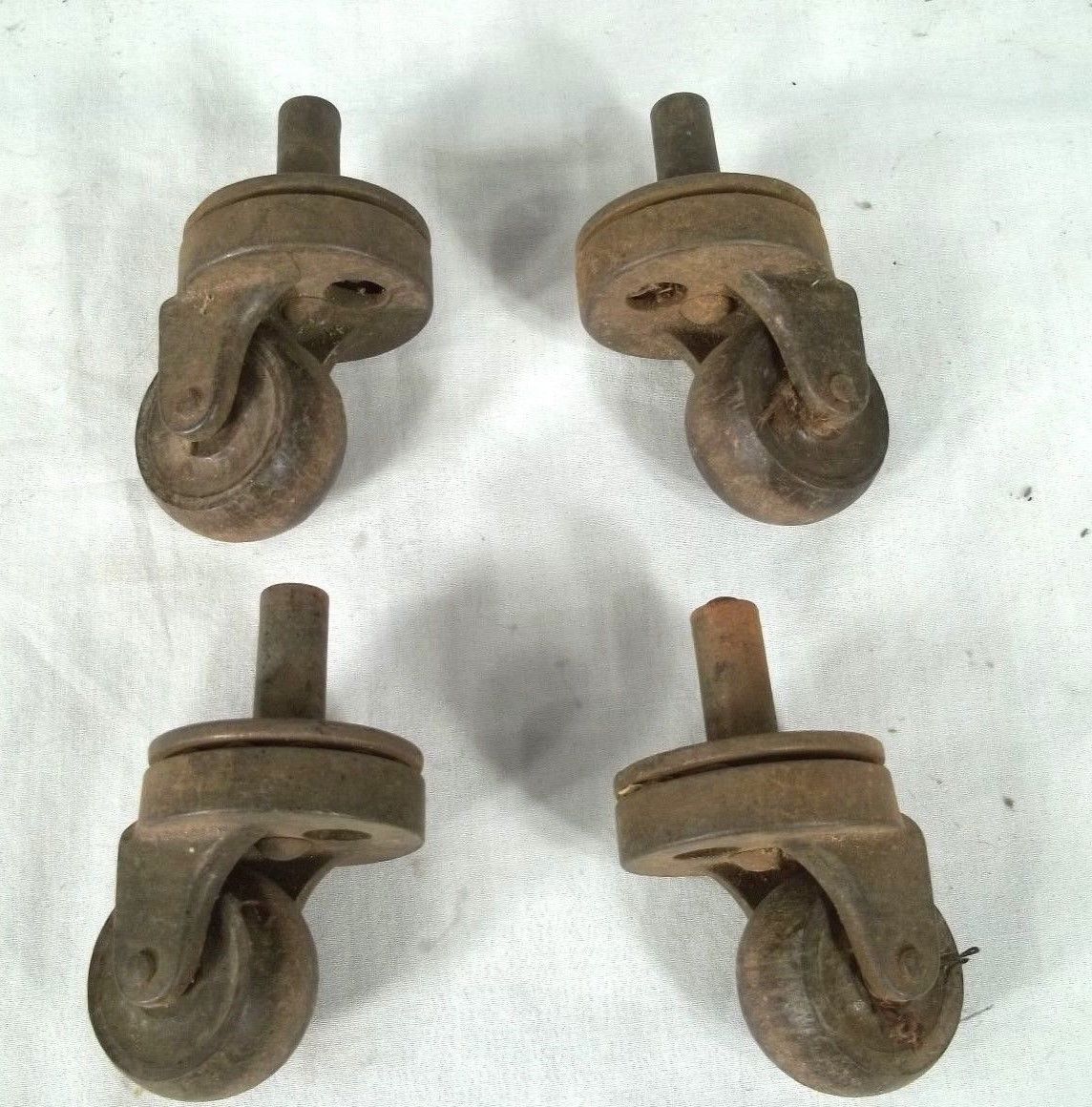 VINTAGE SET OF 4 HEAVY DUTY CAST IRON+WOOD FURNITURE CASTORS Antique