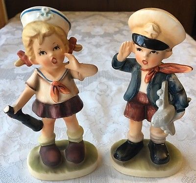 2 Porcelain Figurines Pilot Boy & Sailor Girl made in Japan Hummel Style -- Antique Price Guide Details Page