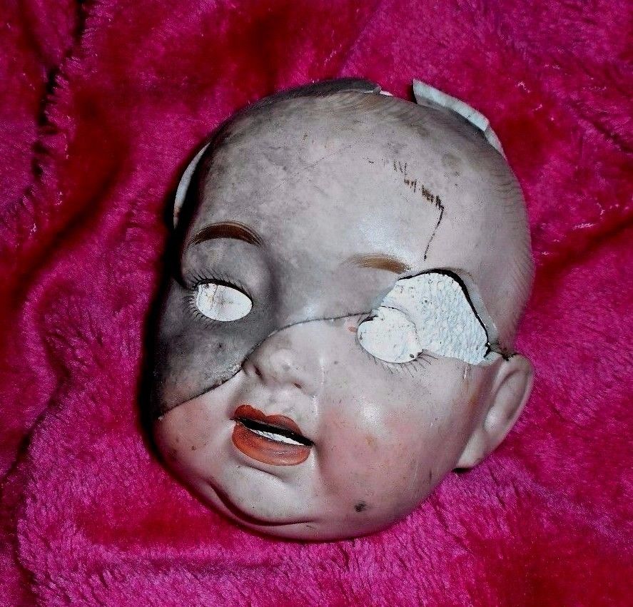 broken porcelain doll