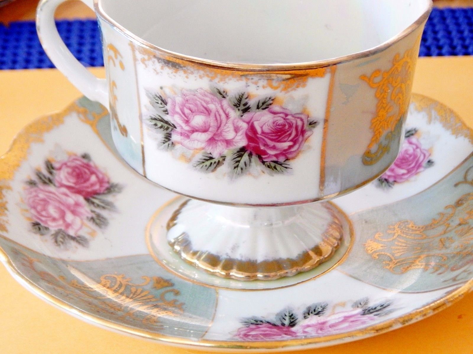 Tea cup and saucer bone china white pink roses lustre gold chip on