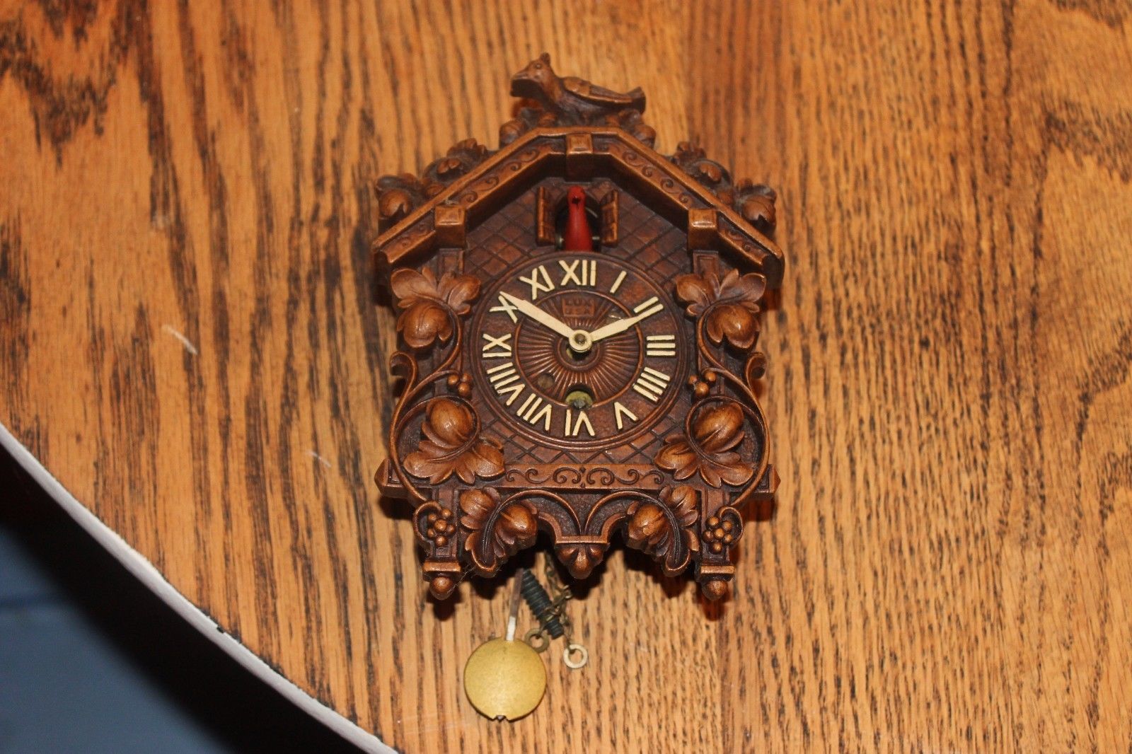 Bobbing Bird Cuckoo Style antique clock made by Lux Antique Price