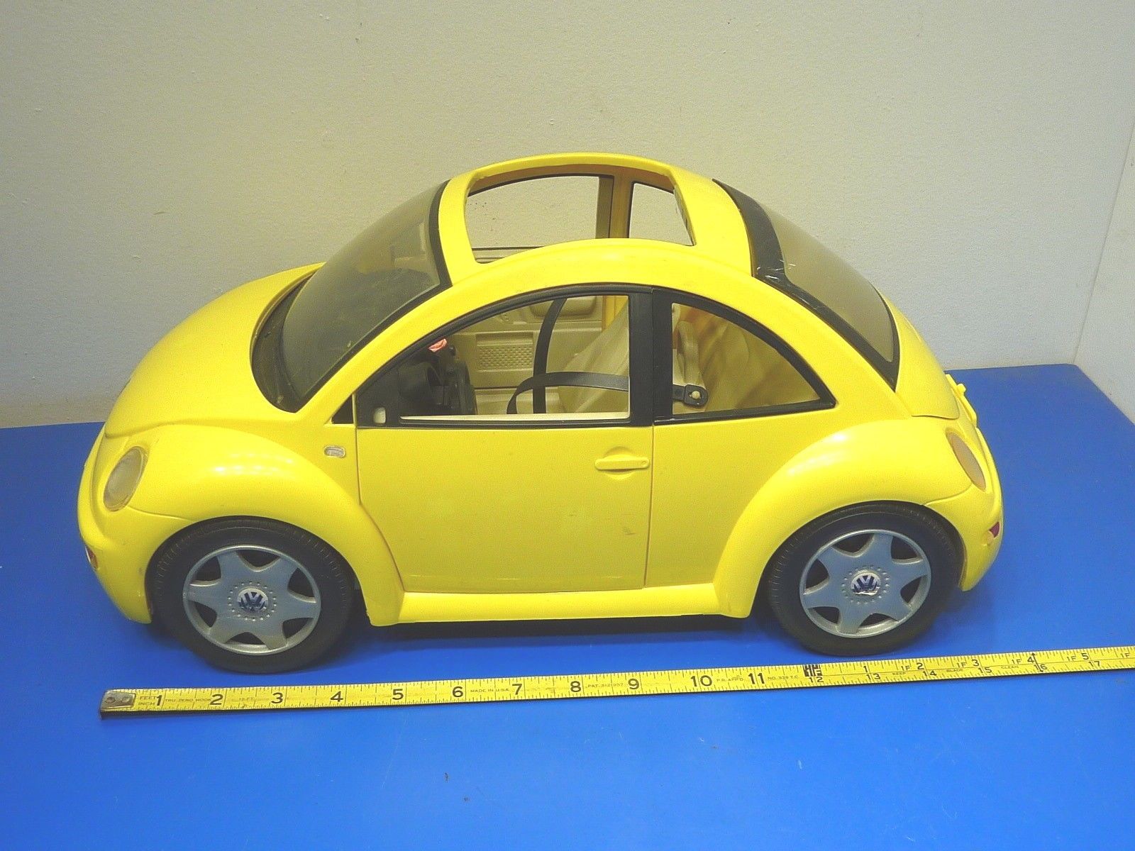 yellow barbie car