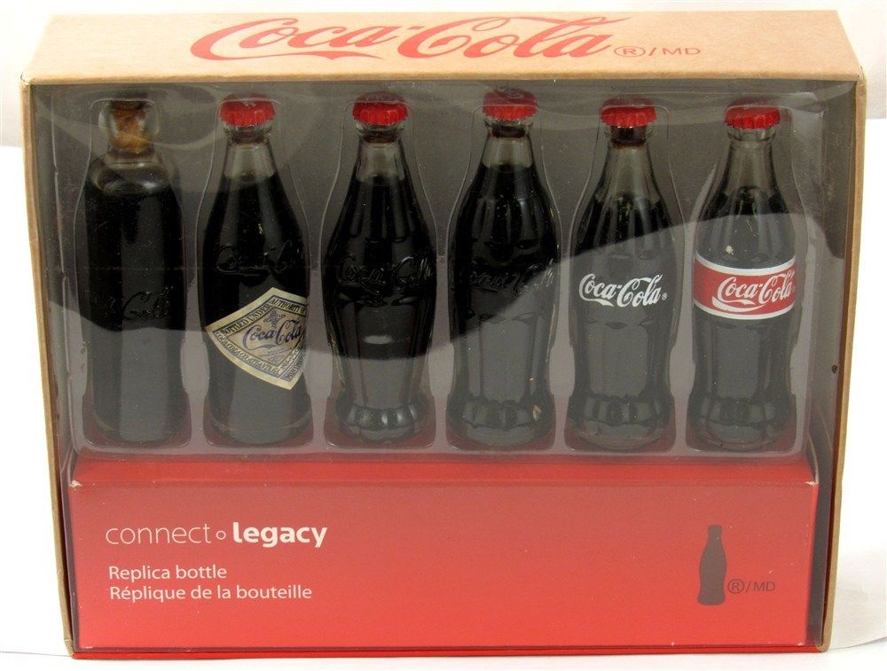 NIB Evolution of the CocaCola Contour Bottle Set Connect Legacy