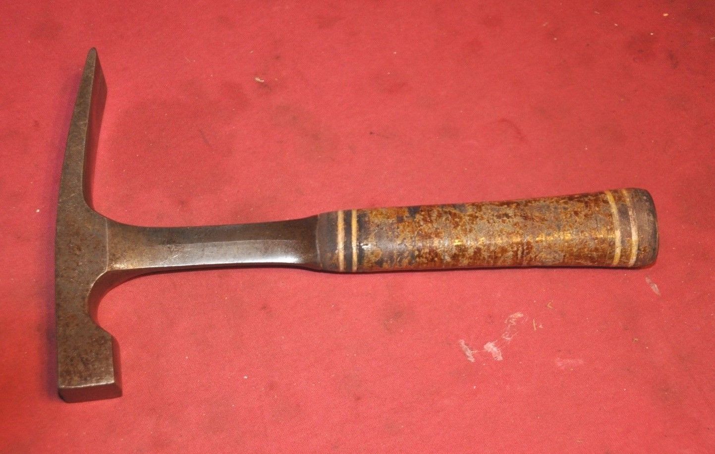 Estwing brick hammer with leather handle made in Rockford, IL