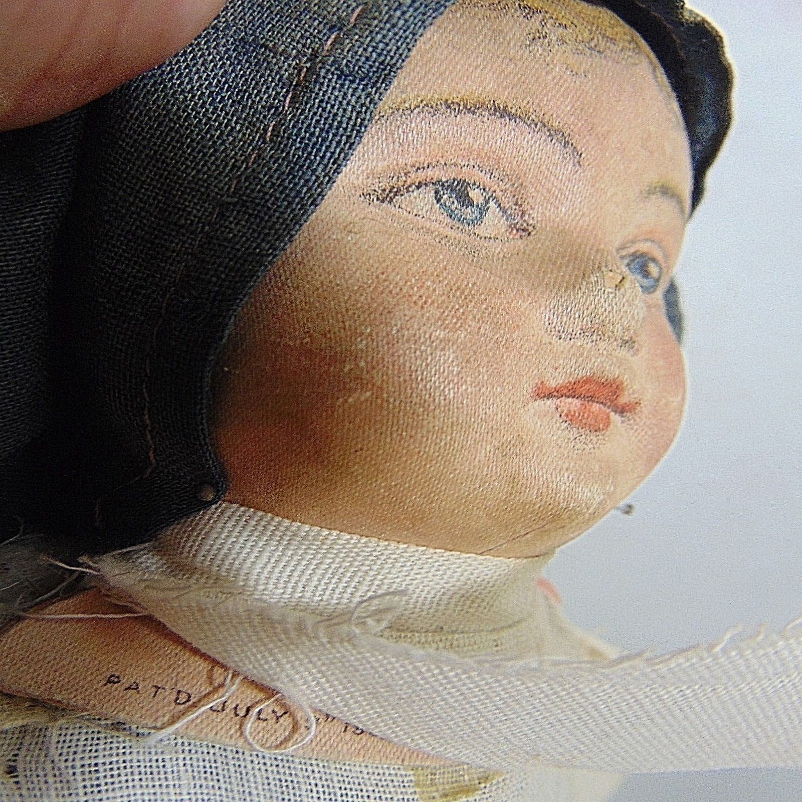 Antique Doll 1901 Cloth Pressed Mask Face Sign Stockinette Vintage
