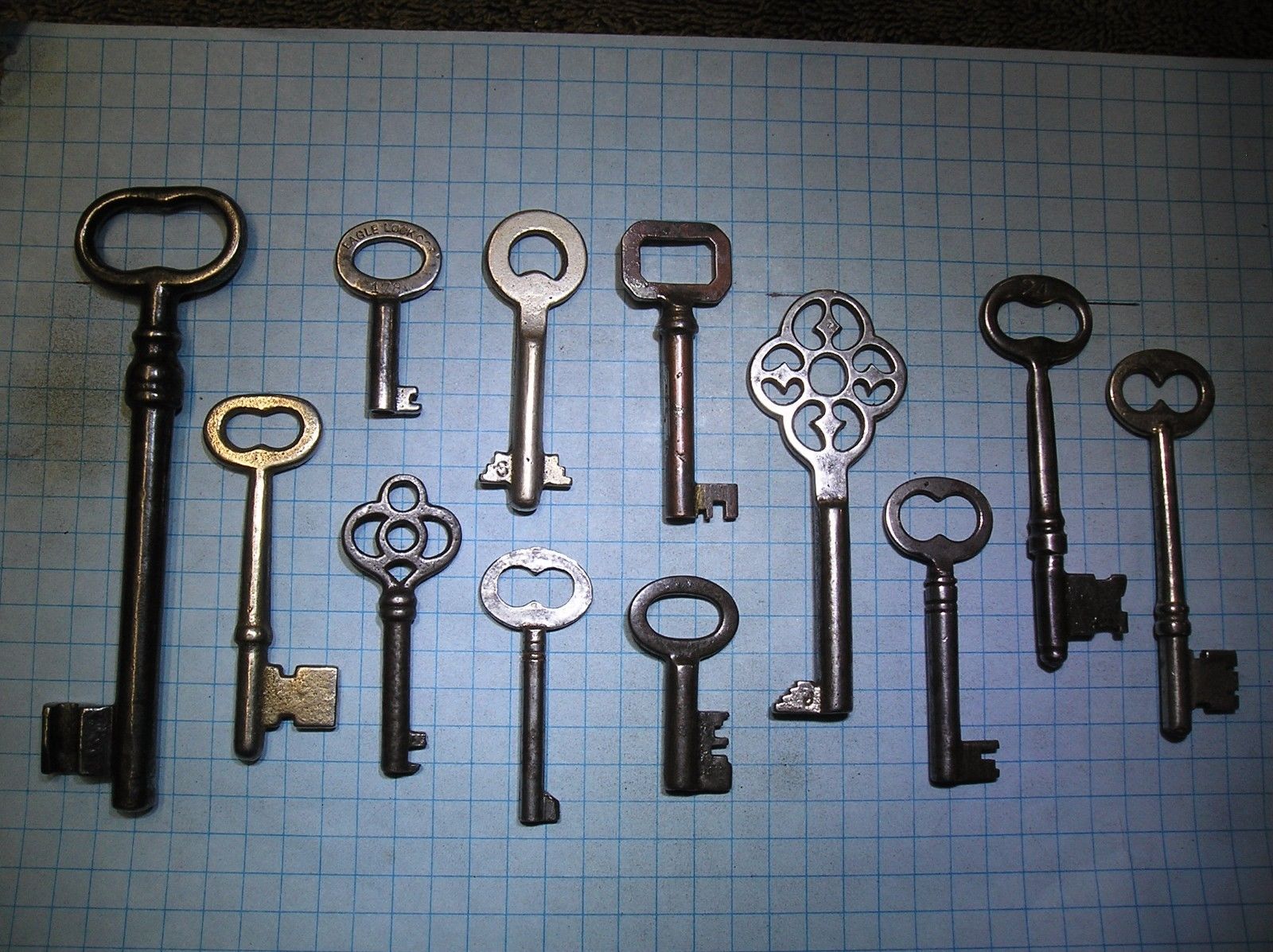 LOT OF 12 ANTIQUE SKELETON, FURNITURE, BARREL, AND OLD LOCK