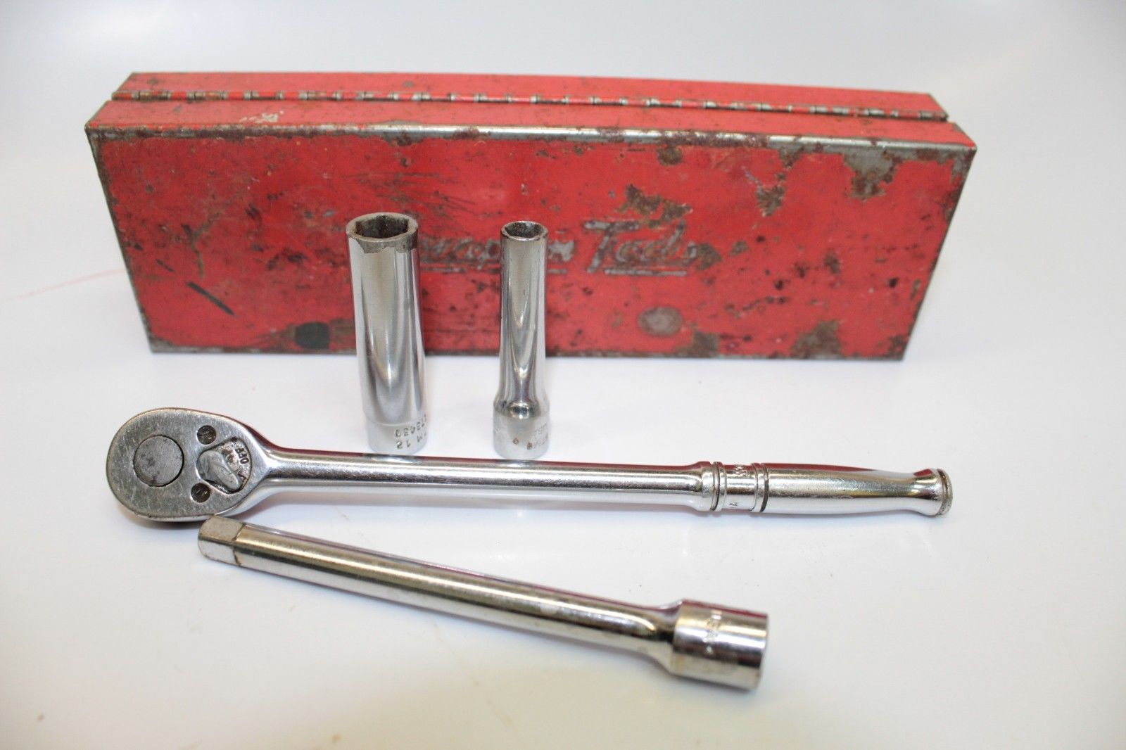 Snapon 1/4" Ratchet, 4" Extension, 3/8" & 1/4" Socket, And box