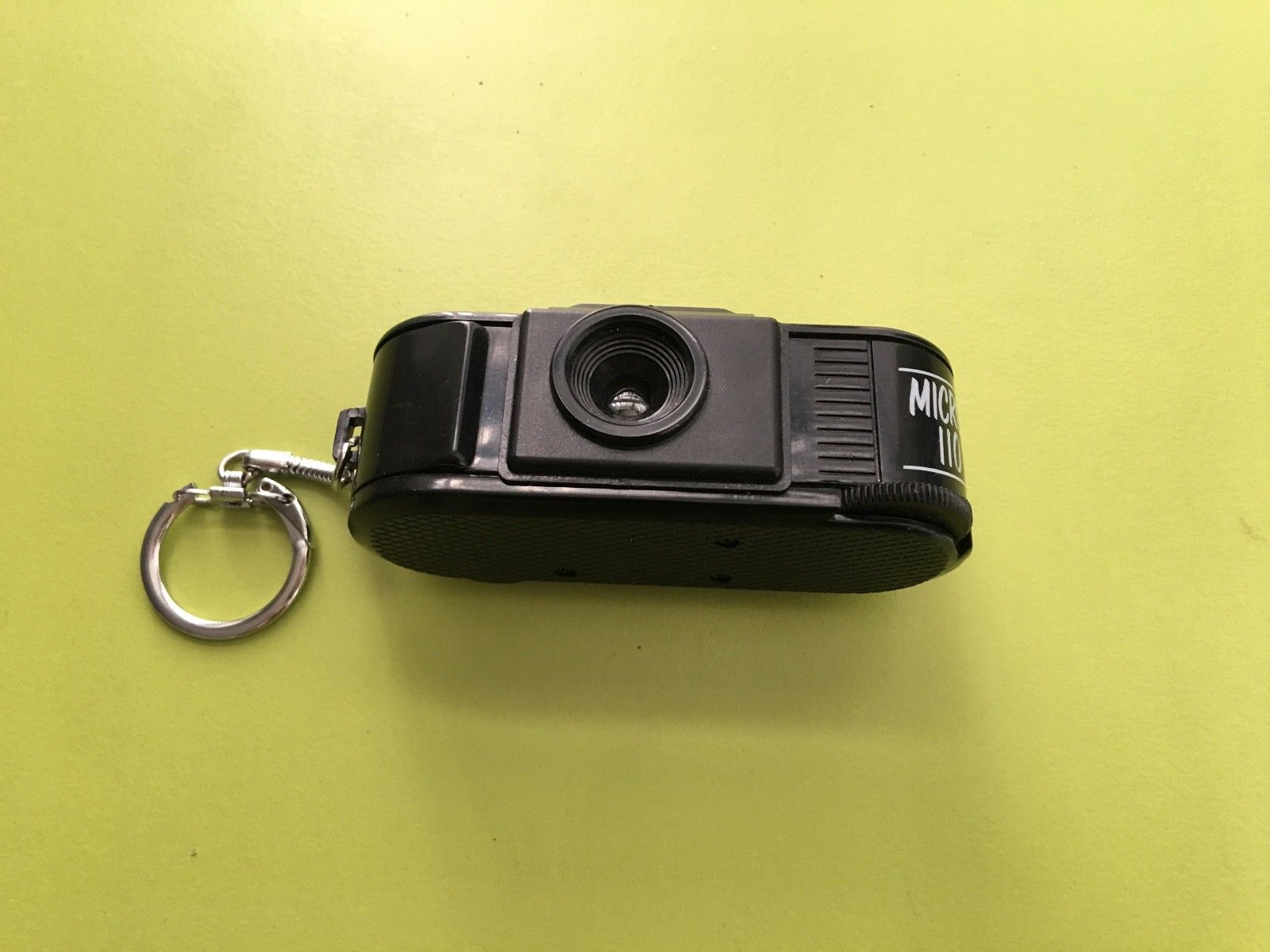 Vintage "Micro 110" Toy Camera Keychain with fresh roll of