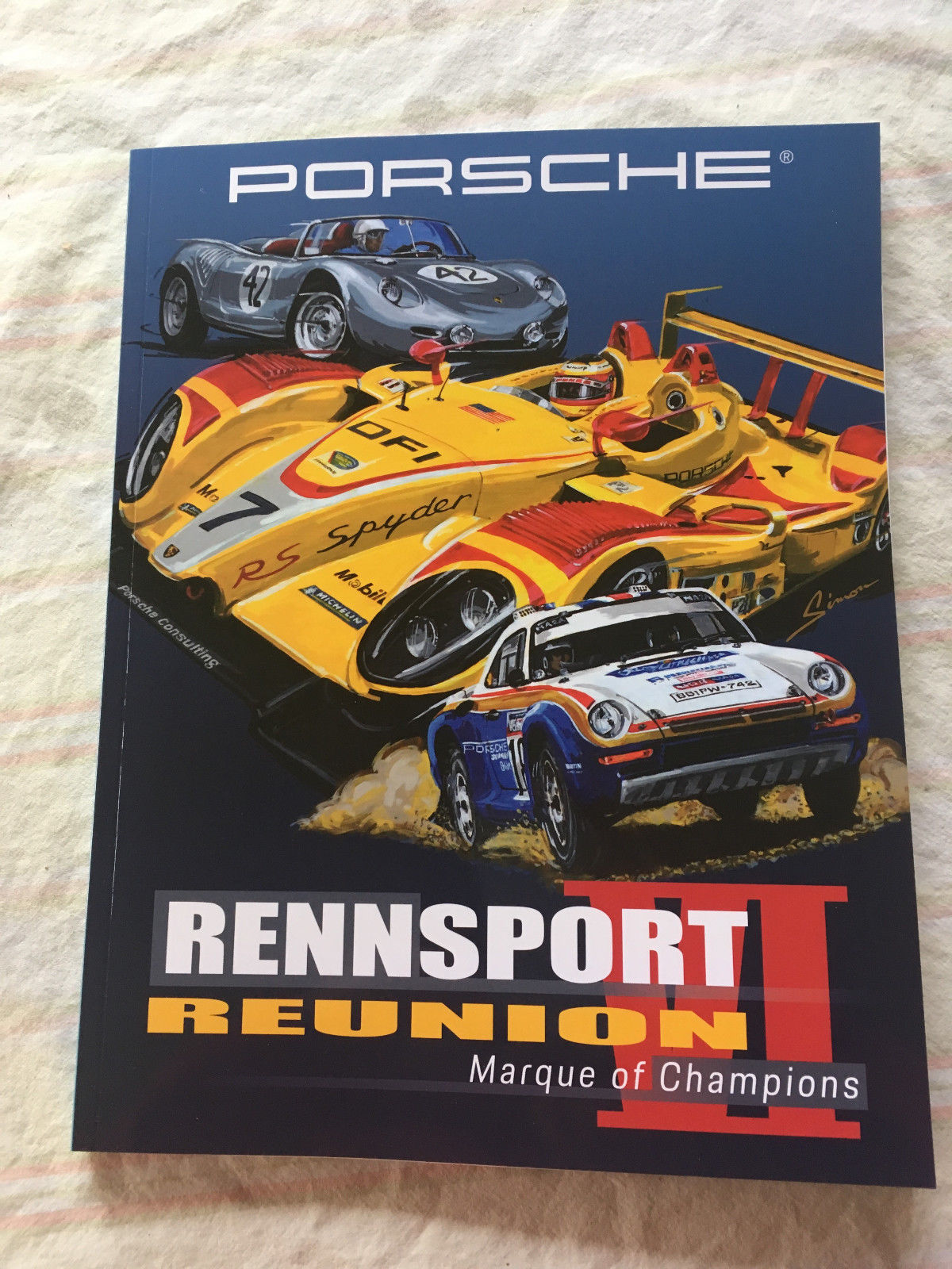 PORSCHE RENNSPORT REUNION VI OFFICIAL PROGRAM AND PORSCHE NEWS/POSTER