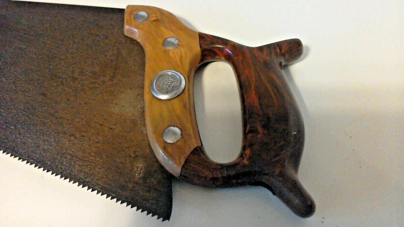 Vintage DISSTON hand saw with two tone disstonite bakelite swirl handle