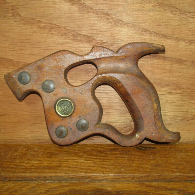 Vintage Disston saw handle thumb hole with brass medallion and screws Antique Price Guide