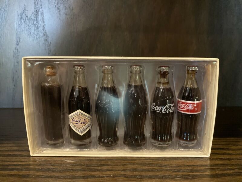Evolution of the Coca Cola Contour Bottle 18991999 Set of Miniature