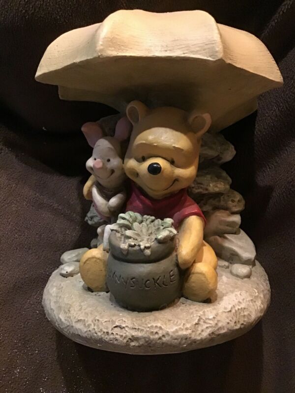 winnie the pooh stone statue