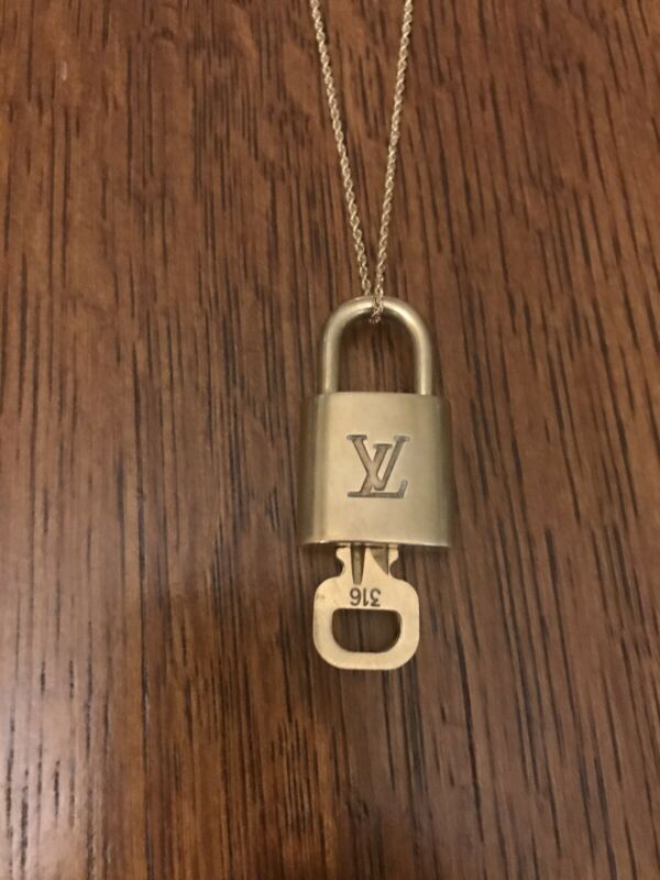 Silver louis vuitton padlock necklace clearance