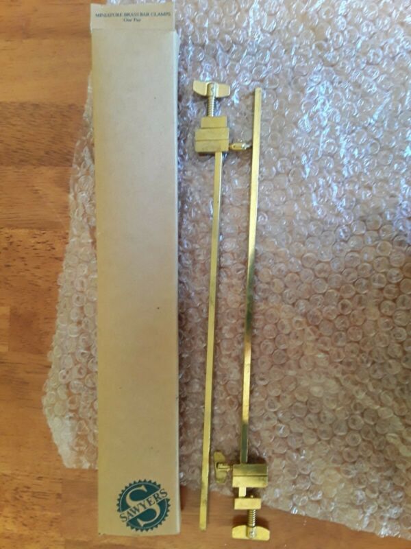 1 Pair Avon Miniature Brass Bar Clamps 1991 Antique Price Guide Details Page